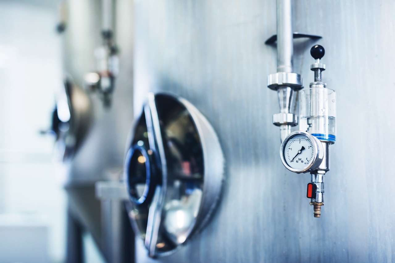 Brewery equipment producing craft beer. Professional machine